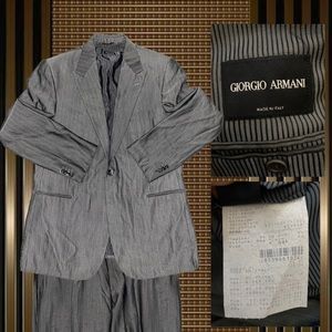 Armani grey pinstripe suit.